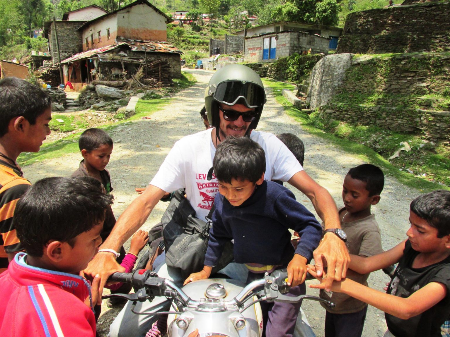 rider with children nepal